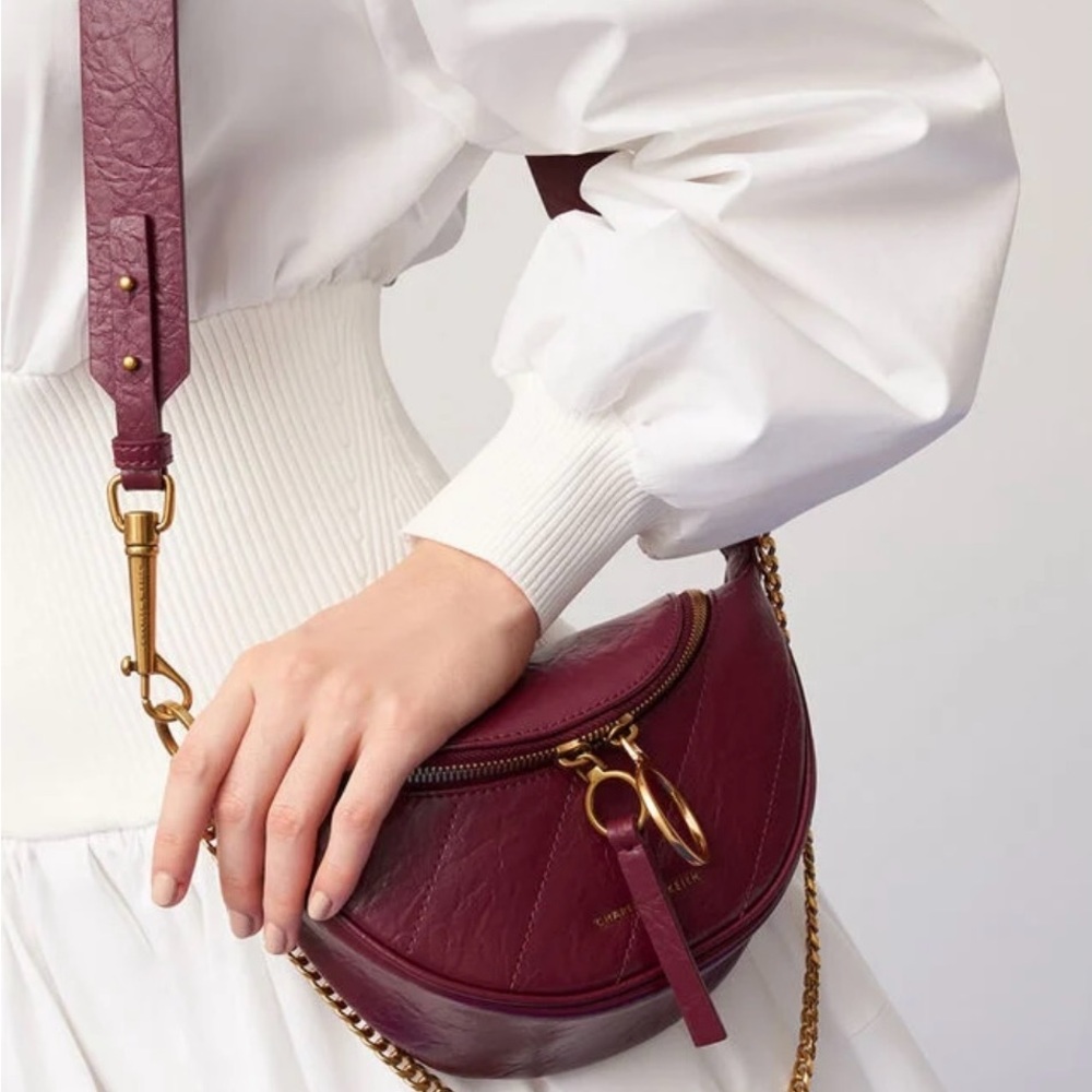 Wrinkle Half-Moon bag 
gold-tone accents & two-way zipper & single chain handle